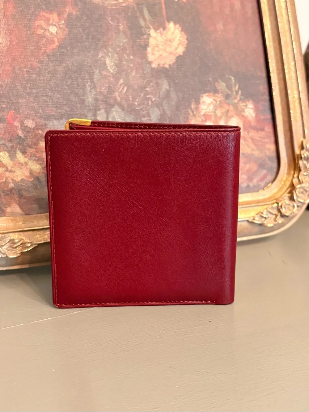 Cartier Burgundy Leather Men's Wallet with Gold Corner Accents